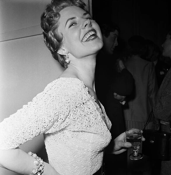 A party held by Barbara Allen, who runs a model agency. London. 21st January 1954