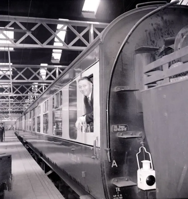 Framed Print : A passenger awaits the depature of his train from Euston Station July 1955 Framed Print : A passenger awaits the depature of his train from Euston Station July 1955