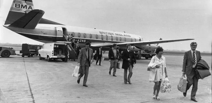 Framed Print : Passengers disembarking from a British Midlands Airlines Vickers Viscount aircraft Framed Print : Passengers disembarking from a British Midlands Airlines Vickers Viscount aircraft