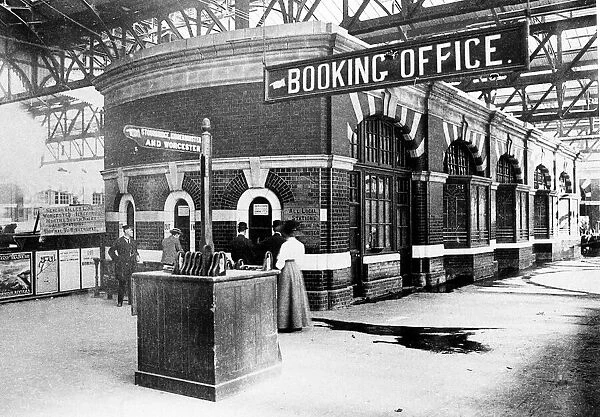 Passengers waiting for the booking office on Platform One at Snow Hill Station in