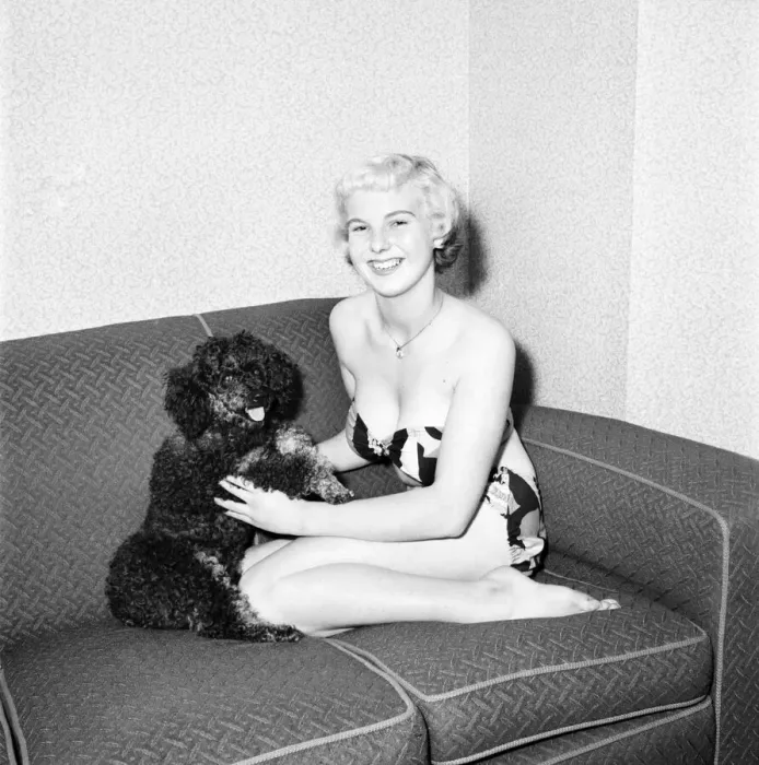 Framed Print : Pat Bolton seen here with her pet poodle dog. 1964 E298-007
