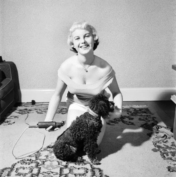 Framed Print : Pat Bolton seen here with her pet poodle dog. 1964 E298 Framed Print : Pat Bolton seen here with her pet poodle dog. 1964 E298