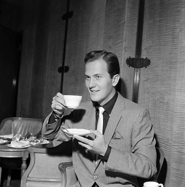 Pat Boone, who arrived in London earlier today to attend next Thursday