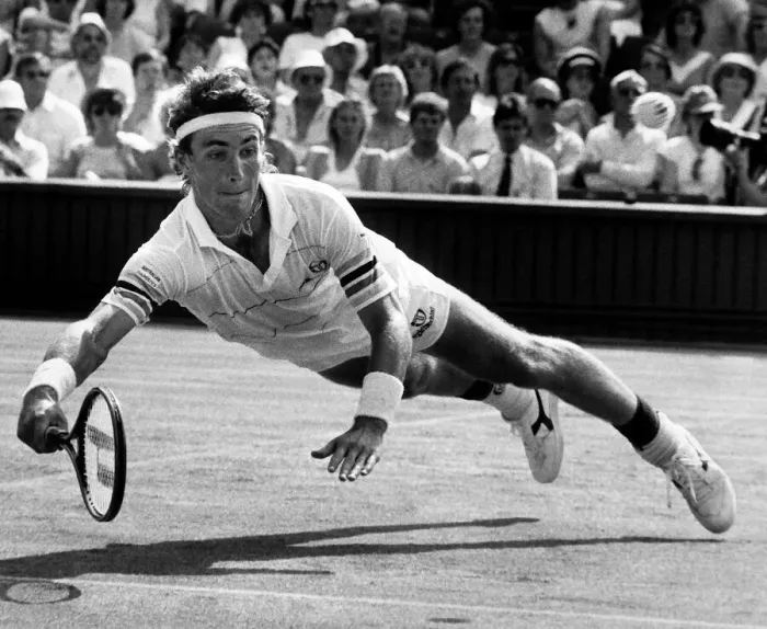 Framed Print : Pat Cash dives for the ball during the match against Mats Wilander