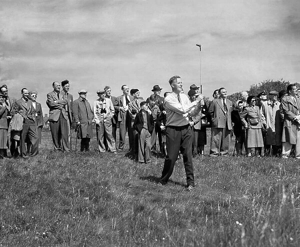 Patey plays out of the rough onto the 6th green. May 1953 P009798