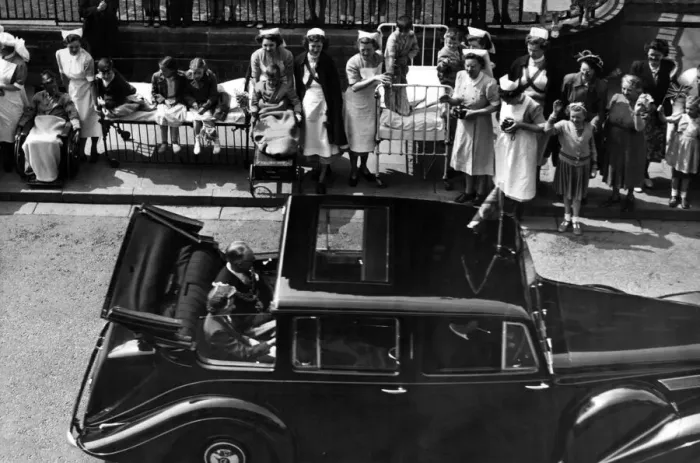 Framed Print : Patients from the Childrens Hospital watch Princess Elizabeth as she passes through Framed Print : Patients from the Childrens Hospital watch Princess Elizabeth as she passes through