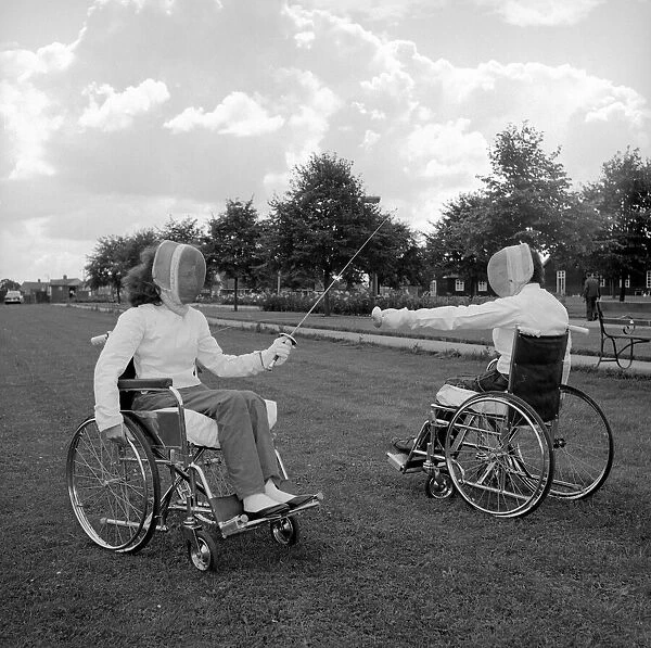 Two patients at the Stoke Manderville Hospital seen here fencing in the hospital grounds