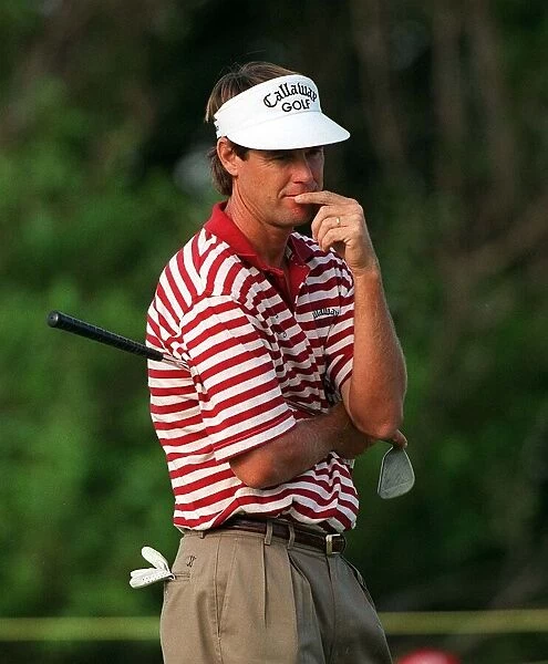 Paul Azinger finger at mouth wearing red white striped t shirt Callaway visor British