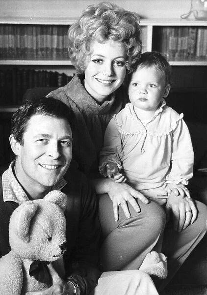 Paul Daneman Actor with his family wife Meredith and baby Sophie relaxing at home
