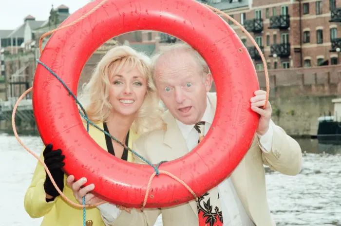Framed Print : Paul Daniels, magician, pictured with wife Debbie McGee, at the riverside, in York Framed Print : Paul Daniels, magician, pictured with wife Debbie McGee, at the riverside, in York