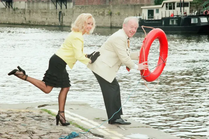 Framed Print : Paul Daniels, magician, pictured with wife Debbie McGee, at the riverside, in York Framed Print : Paul Daniels, magician, pictured with wife Debbie McGee, at the riverside, in York