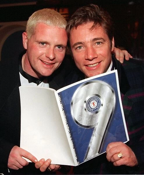 Paul Gascoigne and ally McCoist check out the nine in a row book