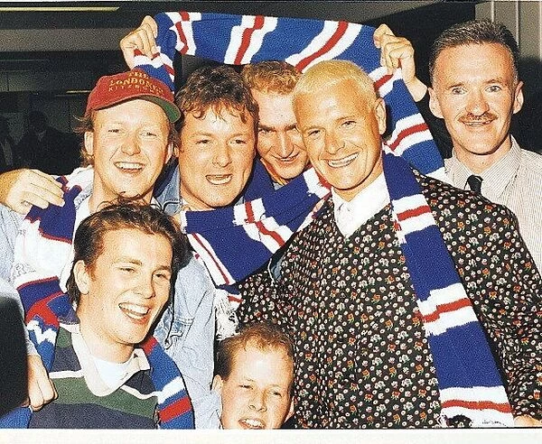 Paul Gascoigne mobbed by fans at Glasgow Airport Football Rangers