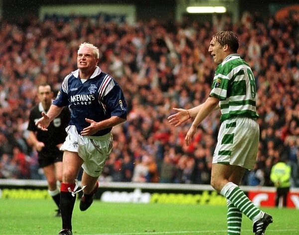 Paul Gascoigne Rangers football player celebrates goal against Celtic with Alan Stubbs