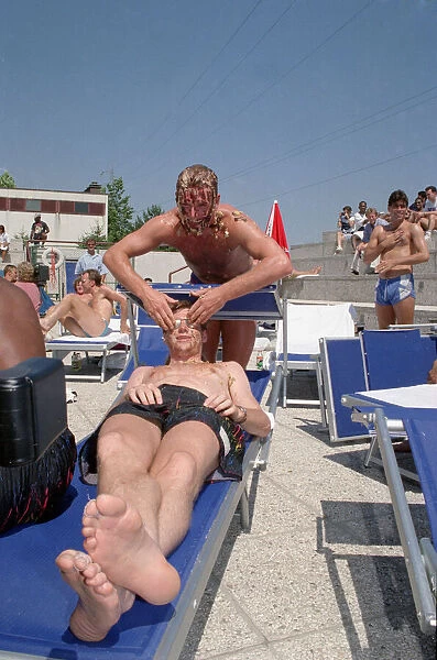 Paul Gascoigne seen here playing about beside the pool at the England Teams hotel in