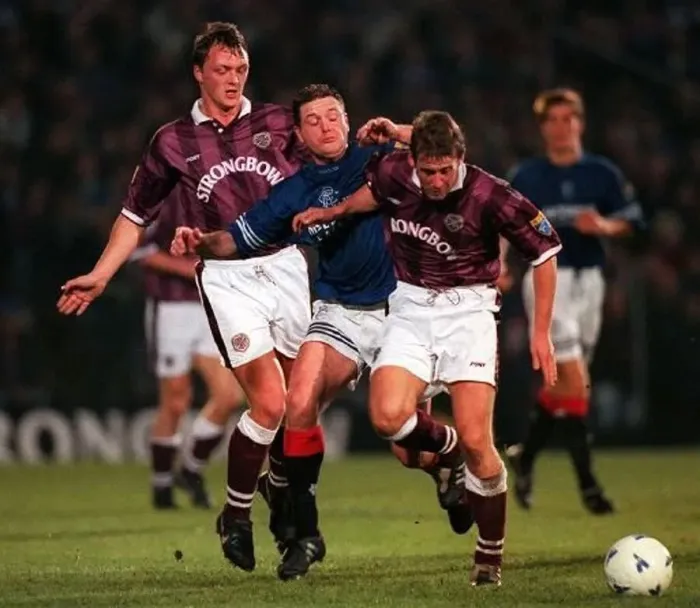 : Paul Gascoigne is tackled by Steve Fulton and Gary Mackay Hearts Rangers Scottish : Paul Gascoigne is tackled by Steve Fulton and Gary Mackay Hearts Rangers Scottish