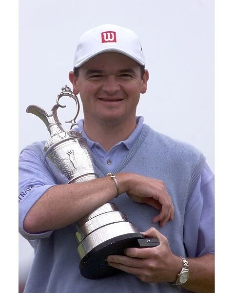 Paul Lawrie golfer holding the Claret Jug July 1999 after winning the British Open