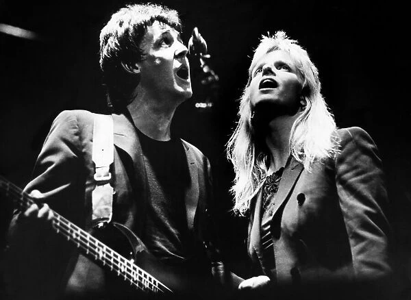 Paul & Linda McCartney with their band Wings performing at the Royal Court Theatre