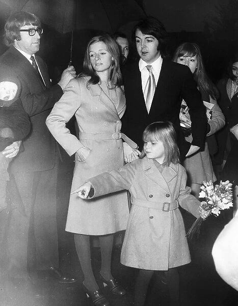 Paul and Linda McCartney after their wedding reception at the Ritz Hotel, London