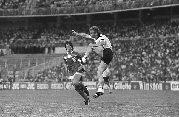 Paul Mariner and Hans Pieter Breigal during world cup 1982 England v Germany