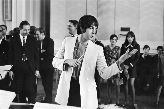 Framed Print : Paul McCartney of The Beatles, conducts the Black Dyke Mills Band, recording a record Framed Print : Paul McCartney of The Beatles, conducts the Black Dyke Mills Band, recording a record