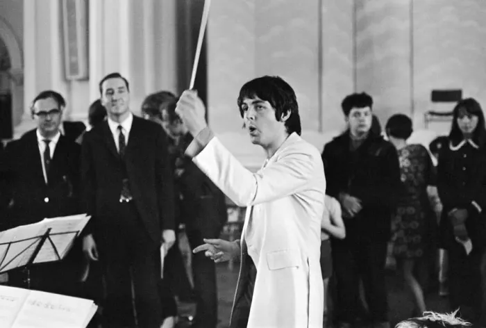 Framed Print : Paul McCartney of The Beatles, conducts the Black Dyke Mills Band, recording a record Framed Print : Paul McCartney of The Beatles, conducts the Black Dyke Mills Band, recording a record