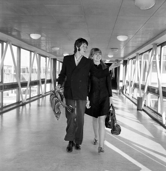 Paul McCartney of the Beatles and Jane Asher at Heathrow today
