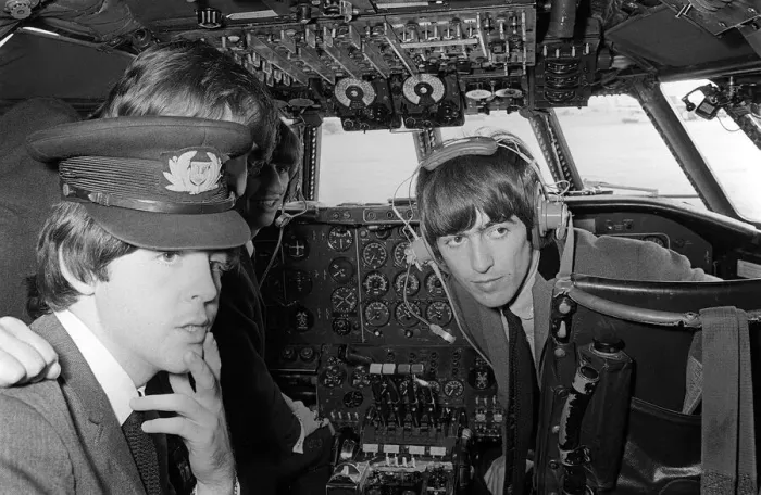 Framed Print : Paul McCartney, George Harrison and Ringo Starr in the cockpit on the plane bound for