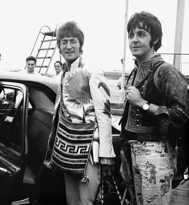 Framed Print : Paul McCartney and John Lennon arrive back in England from a Greek holiday July 1967 Framed Print : Paul McCartney and John Lennon arrive back in England from a Greek holiday July 1967