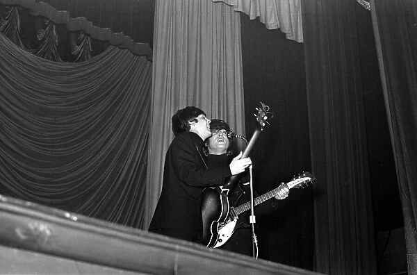 Paul McCartney and John Lennon of The Beatles performing at the ABC Cinema, Ardwick