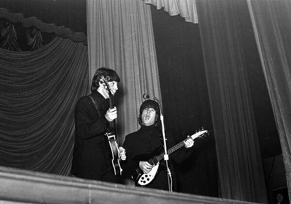 Paul McCartney and John Lennon of The Beatles performing at the ABC Cinema, Ardwick