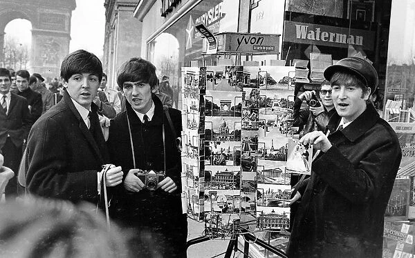 Paul MCCartney (left), George Harrison and John Lennon on the Champs Elysees before Ringo