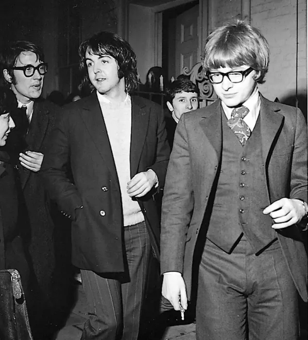 Framed Print : Paul McCartney with Peter Asher leaving Apples offices February 1969