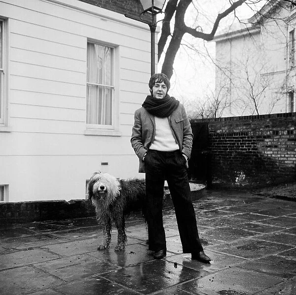 Paul McCartney seen here outside his home in St Johns Wood with his dog Martha