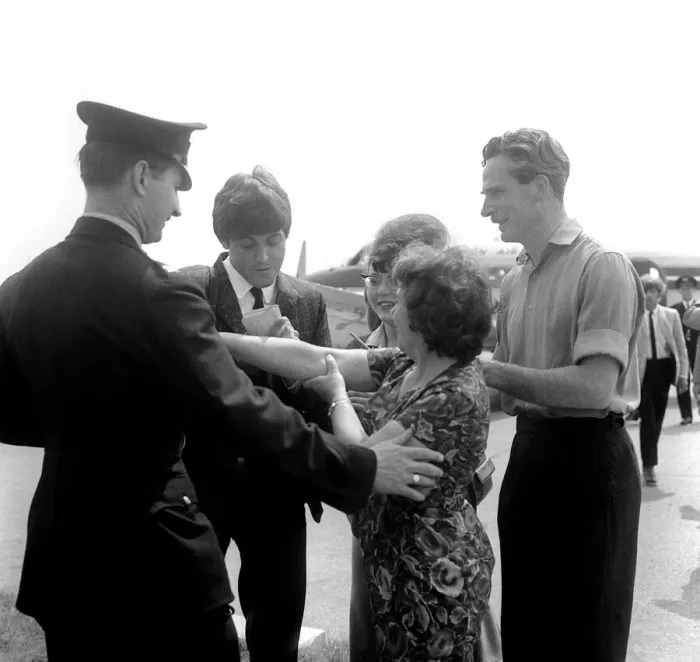 Framed Print : Paul McCartney a signing autographs for fans after arriving at Luton Airport, May 1964