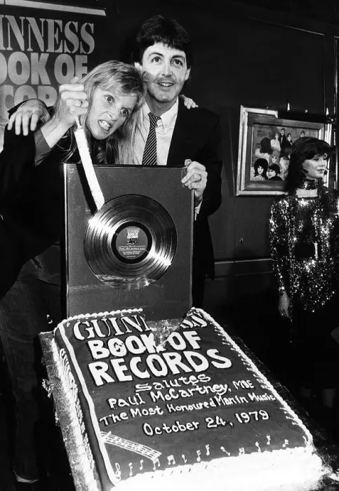 Framed Print : Paul McCartney former singer with The Beatles and wife Linda at the Guinness book of Framed Print : Paul McCartney former singer with The Beatles and wife Linda at the Guinness book of