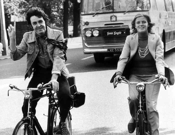 Framed Print : Paul McCartney former singer with The Beatles with wife Linda out riding bicycles Framed Print : Paul McCartney former singer with The Beatles with wife Linda out riding bicycles