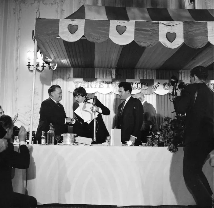 Framed Print : Paul McCartney strugges to shake hands with Sir Billy Butlin when receiving three Ivor Framed Print : Paul McCartney strugges to shake hands with Sir Billy Butlin when receiving three Ivor