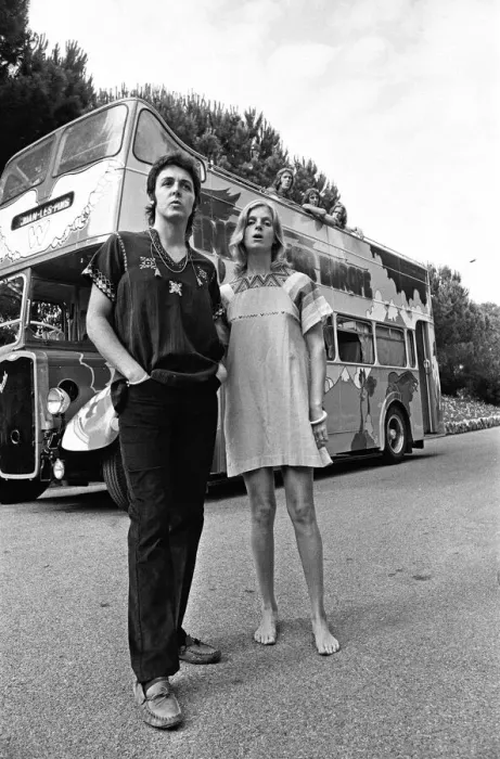 Framed Print : Paul McCartney and his wife Linda in Paris, France, with other members of the group Wings