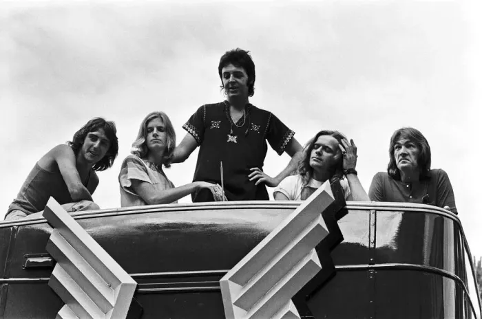 Framed Print : Paul McCartney and his wife Linda in Paris, France, with other members of the group Wings Framed Print : Paul McCartney and his wife Linda in Paris, France, with other members of the group Wings