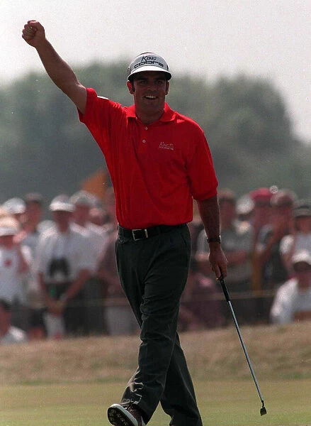Paul McGinley Golfer salutes to the crowd after scoring a birdie on the 17th hole