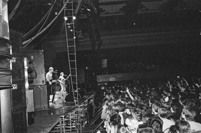 Framed Print : Paul Weller, and his band, The Jam, pictured during their final ever gig in 1982 Framed Print : Paul Weller, and his band, The Jam, pictured during their final ever gig in 1982