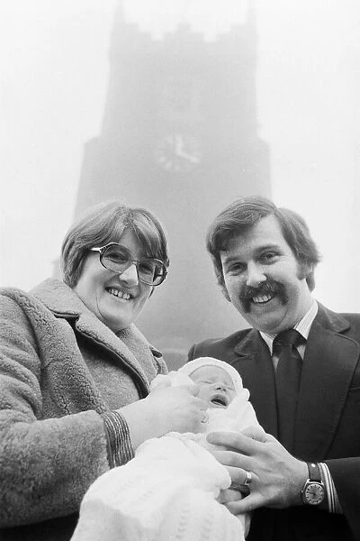 PC Graham Browne and his wife Yvonne pose with their eight week old baby son Clive Brown