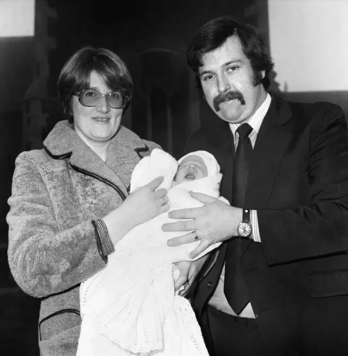 Framed Print : PC Graham Browne and his wife Yvonne pose with their eight week old baby son Clive Brown Framed Print : PC Graham Browne and his wife Yvonne pose with their eight week old baby son Clive Brown