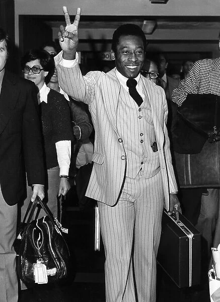 Pele football player for Brazil arriving at Heathrow Airport from Lisbon 1977