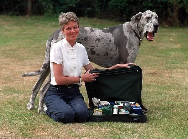 Penny Junor TV presenter with her dog and suitcase for Celebs and their Suitcases feature