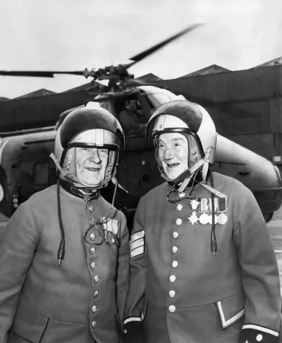 Framed Print : Pensioner Pilots Two helmeted Chelsea Pensioners stand ready for their first Framed Print : Pensioner Pilots Two helmeted Chelsea Pensioners stand ready for their first