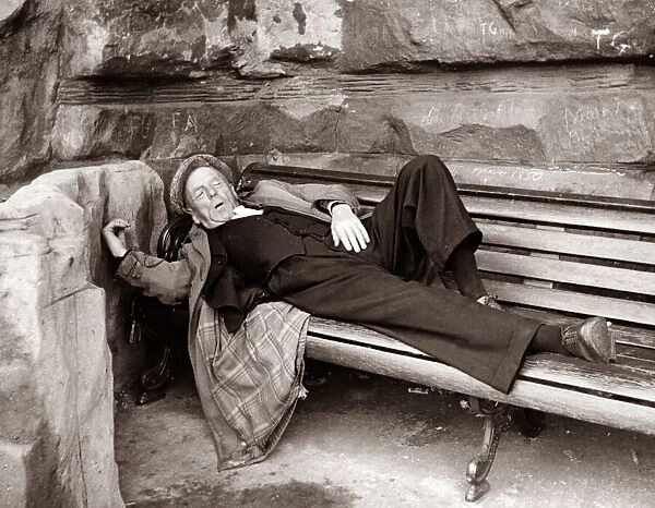 Pensioner takes a nap on a park bench Sleeping old people Senior gentleman