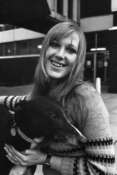 People with animals. Woman. Fiena Ward with her dog Barnabas outside Manchester College