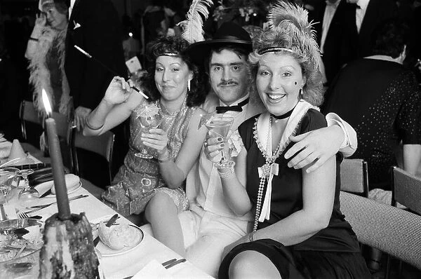 People celebrating New Years Eve at a Roaring Twenties party